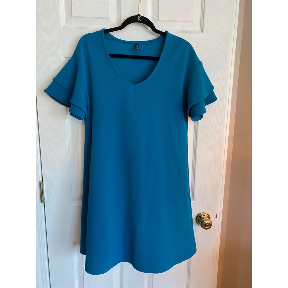 Turquoise flowy dress with accent sleeves